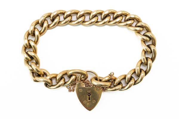 A 9CT GOLD SOLID CURB LINK BRACELET