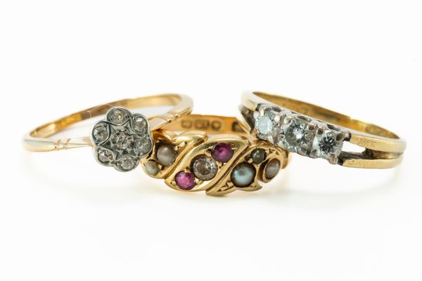 THREE GOLD AND GEM SET RINGS (3)