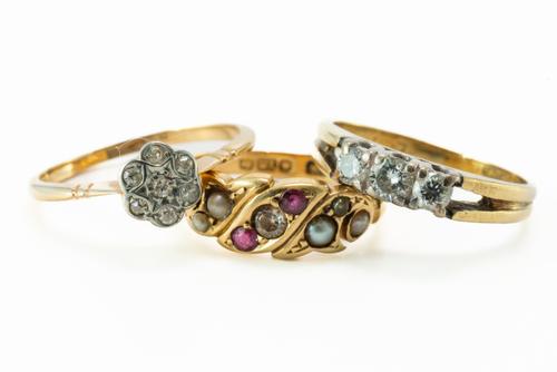 THREE GOLD AND GEM SET RINGS (3)