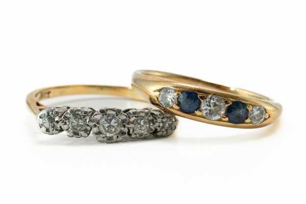 A FIVE STONE DIAMOND RING AND A DIAMOND AND SAPPHIRE RING (2)