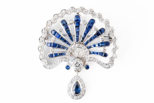 A SAPPHIRE AND DIAMOND SPRAY BROOCH