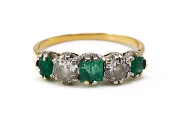 AN EMERALD AND DIAMOND RING