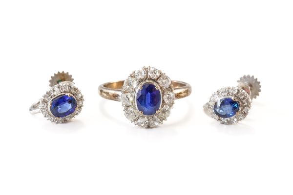 A SAPPHIRE AND DIAMOND OVAL CLUSTER RING AND A PAIR OF EARRINGS (3)