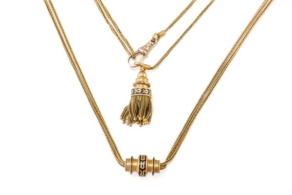 A FRENCH GOLD LONG CHAIN WITH A TASSEL AND A SLIDER