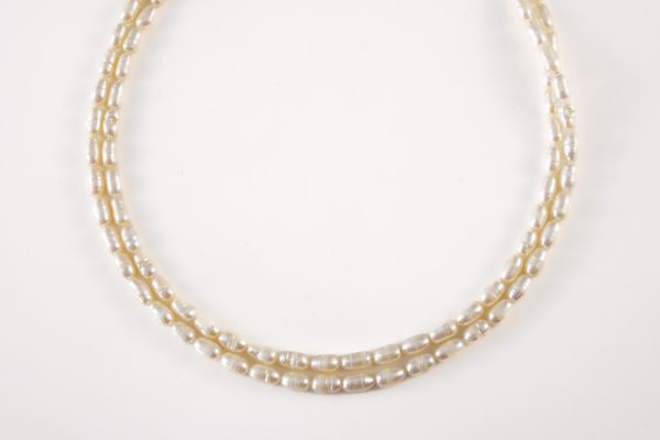 A FRESHWATER CULTURED PEARL NECKLACE WITH A DIAMOND SET CLASP