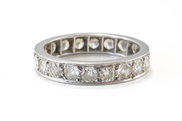 A PLATINUM AND DIAMOND FULL ETERNITY RING