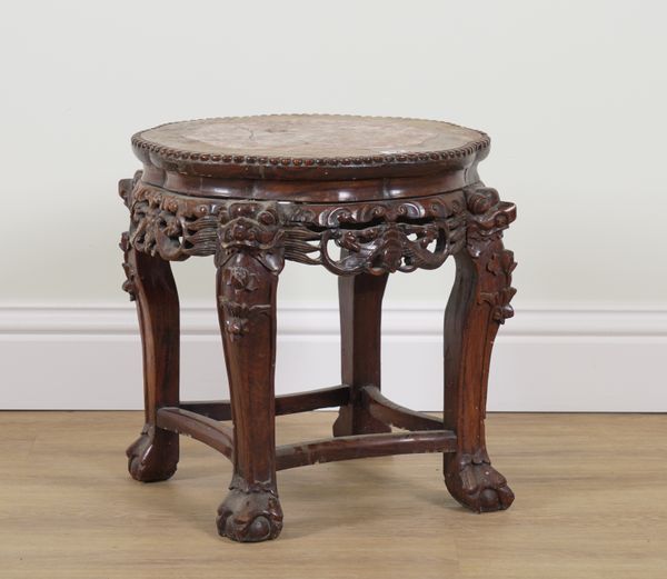 A CHINESE CARVED HARDWOOD INSET MARBLE JARDINIERE STAND