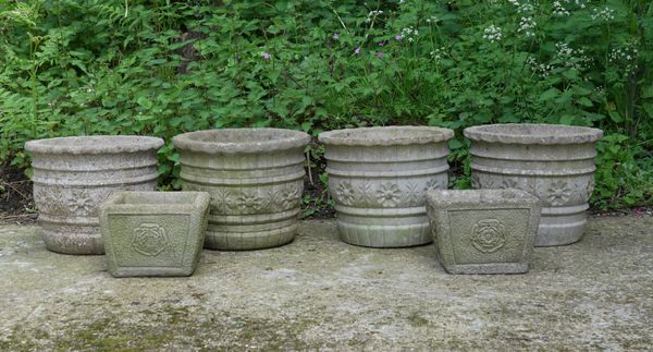 A SET OF FOUR RECONSTITUTED STONE CIRCULAR PLANTERS (6)