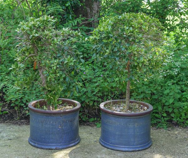 J.CHAMBERLAIN & CO; A PAIR OF BLUE GLAZED TERRACOTTA CIRCULAR PLANT POTS (2)