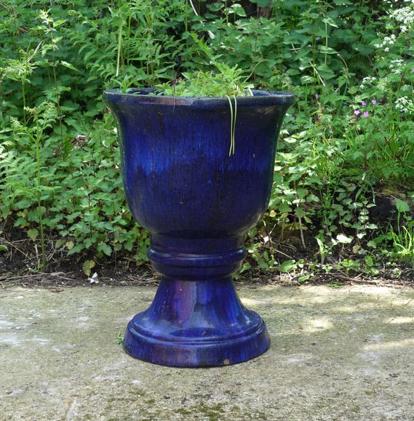 A BLUE GLAZED TERRACOTTA  GARDEN POT