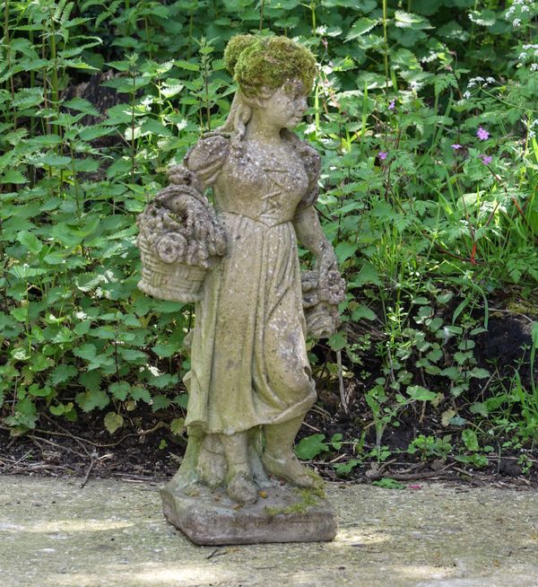 A RECONSTITUTED STONE FEMALE FIGURE