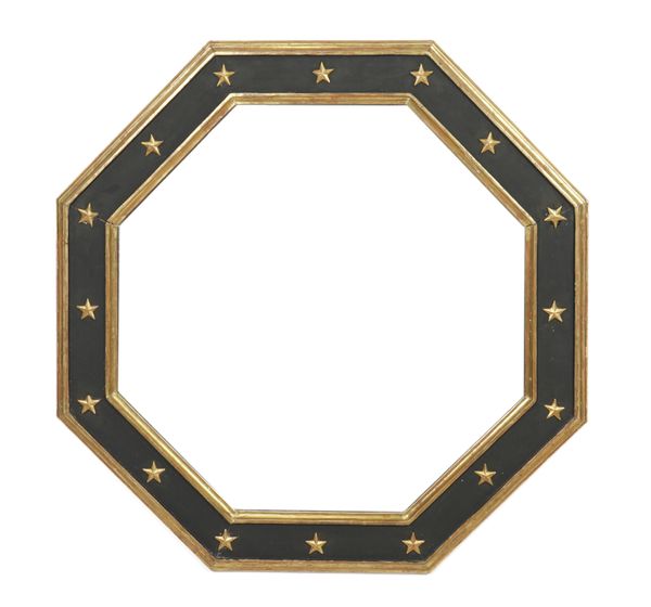 A REGENCY STYLE BLACK PAINTED PARCEL GILT DECORATED OCTAGONAL MIRROR (2)