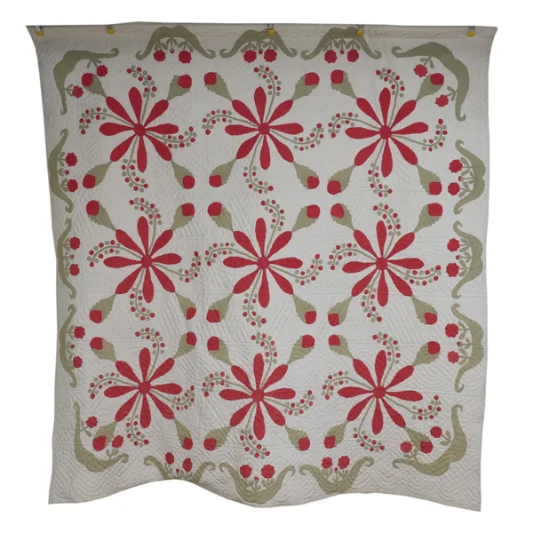 TWO POSSIBLY AMERICAN QUILTS WITH STYLISED RED FLORAL AND GREEN LEAF DESIGN (2)