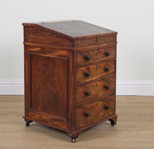AN EARLY 19TH CENTURY MAHOGANY SLIDE TOP DAVENPORT