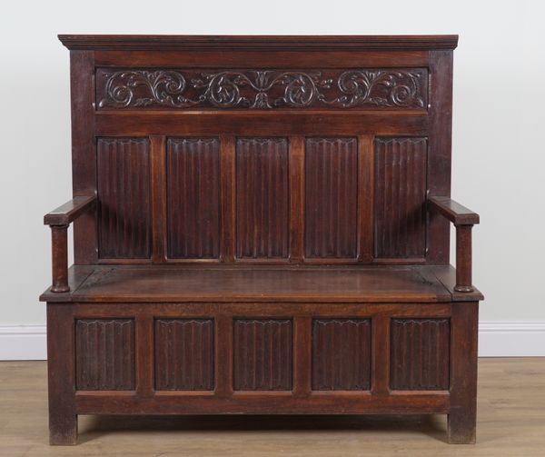 AN 18TH CENTURY STYLE OAK LINEN FOLD PANEL BACK BOX SEAT SETTLE