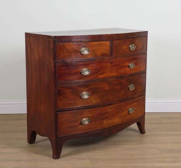 A REGENCY MAHOGANY BOWFRONT FIVE DRAWER CHEST