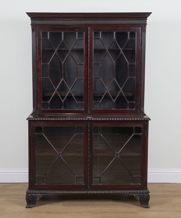 A LATE VICTORIAN MAHOGANY DOUBLE HEIGHT ASTRAGAL GLAZED BOOKCASE