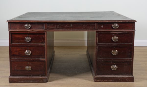 A LATE GEORGE III MAHOGANY PARTNER'S PEDESTAL DESK