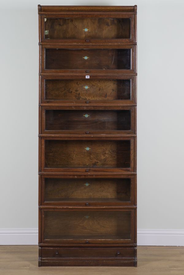 GLOBE-WERNICKE; A MID-20TH CENTURY SEVEN TIER OAK GLAZED BOOKCASE