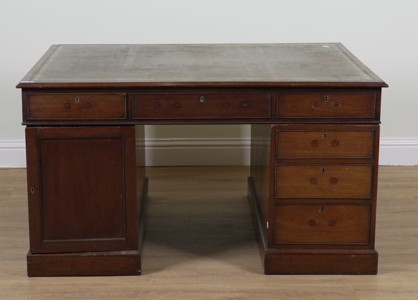 A GEORGE III STYLE MAHOGANY PARTNER'S NINE DRAWER PEDESTAL DESK