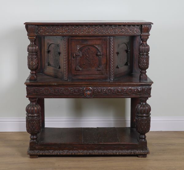 A 17TH CENTURY AND LATER OAK CABINET ON STAND