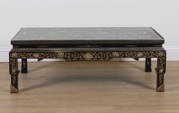 A BLACK LACQUER CHINOISERIE DECORATED RECTANGULAR COFFEE TABLE