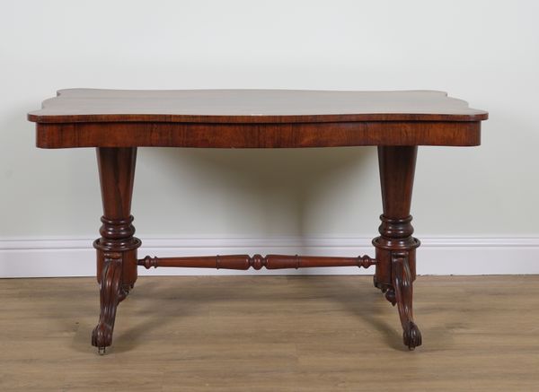 A VICTORIAN SHAPED ROSEWOOD CENTRE TABLE