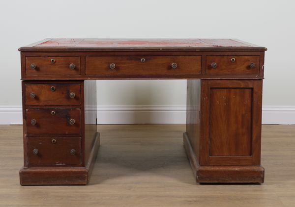 A GEORGE III MAHOGANY NINE DRAWER PARTNER'S PEDESTAL DESK