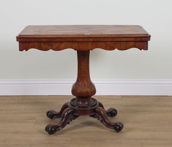 A VICTORIAN ROSEWOOD FOLDOVER CARD TABLE