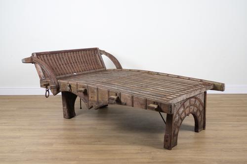 A TEAK AND WROUGHT IRON BOUND DAY BED/OX CART