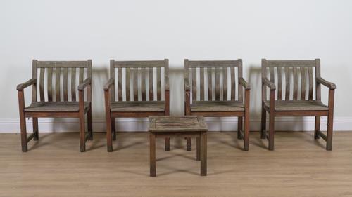 A SET OF FOUR HARDWOOD GARDEN OPEN ARMCHAIRS (5)