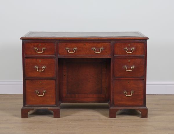 A VICTORIAN MAHOGANY WRITING DESK