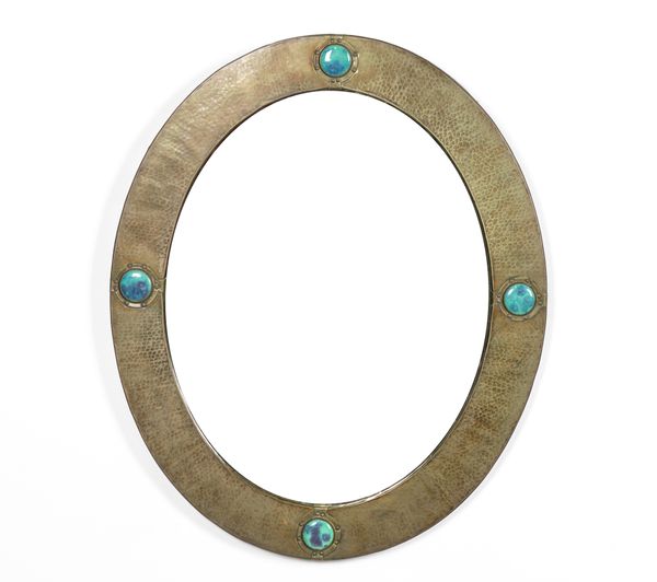 LIBERTY AND CO LTD LONDON; AN OVAL COPPER WALL MIRROR