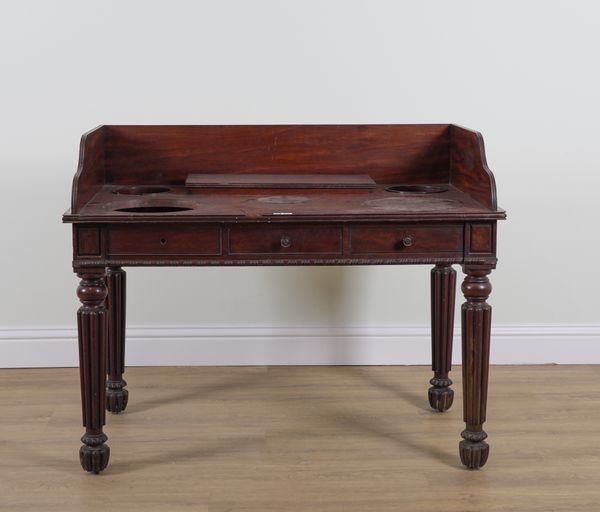 IN THE MANNER OF GILLOWS; A WILLIAM IV MAHOGANY GALLERIED WASH STAND