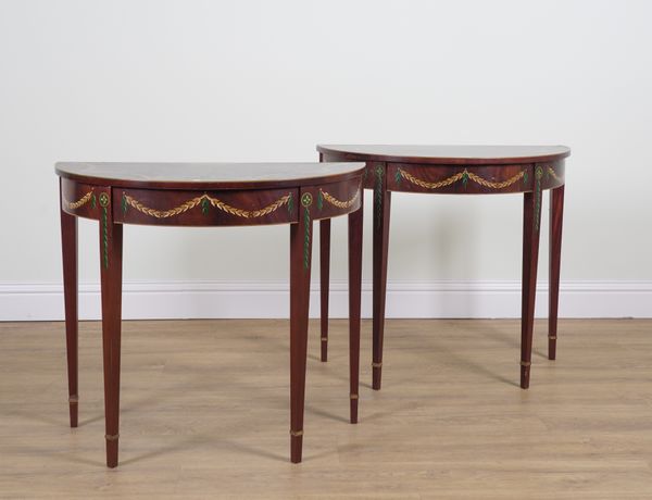 A PAIR OF GEORGE III STYLE POLYCHROME DECORATED MAHOGANY DEMI LUNE CONSOLE TABLES (2)