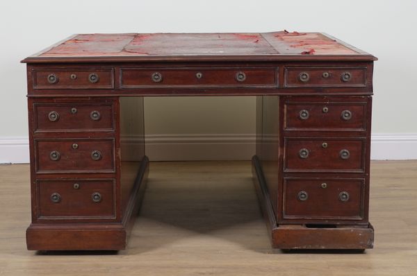 A GEORGE III MAHOGANY PEDESTAL PARTNER'S DESK WITH NINE DRAWERS AND APPOSING CUPBOARDS