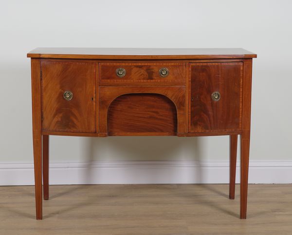 A GEORGE III STYLE SATINWOOD BANDED MAHOGANY BOW FRONT SIDEBOARD