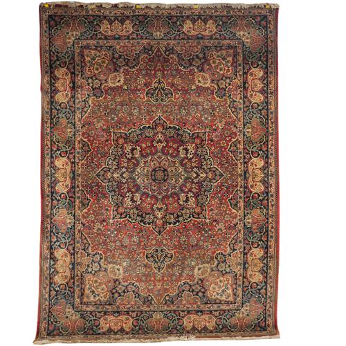 A MACHINE MADE CARPET OF PERSIAN DESIGN
