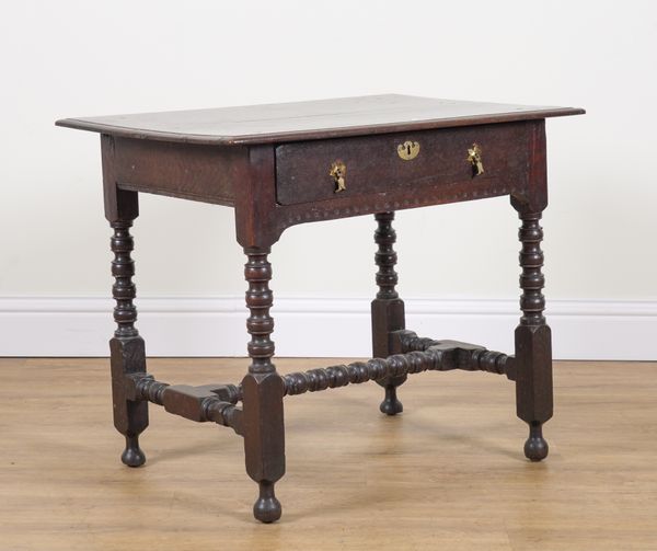 A 17TH CENTURY OAK SINGLE DRAWER SIDE TABLE