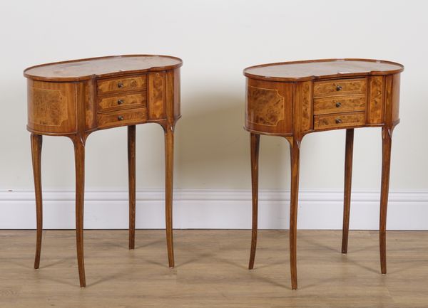 A PAIR OF 18TH CENTURY STYLE FRENCH FIGURED WALNUT AND MAHOGANY KIDNEY SHAPED THREE DRAWER SIDE TABLES (2)