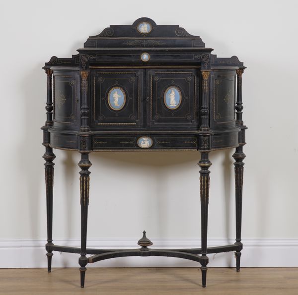 A VICTORIAN GILT METAL MOUNTED EBONISED SIDE CABINET