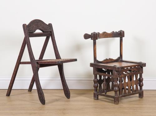 A TRIBAL STYLE HARDWOOD LOW CHAIR (2)