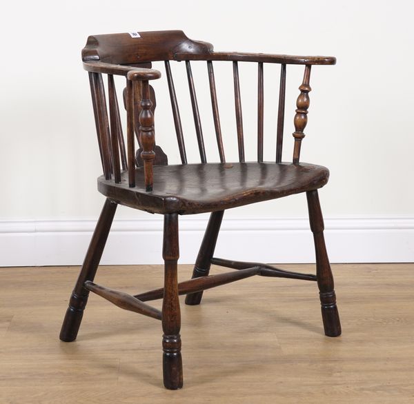 A LATE 19TH CENTURY ASH AND ELM TUB BACK CHAIR