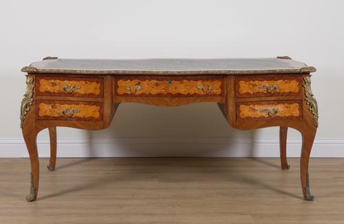A LOUIS XVI STYLE GILT METAL MOUNTED MAHOGANY AND YEW INLAID BUREAU PLAT