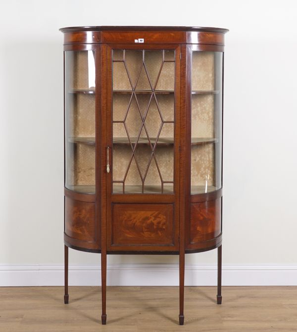 AN EDWARDIAN MAHOGANY BOWFRONT DISPLAY CABINET