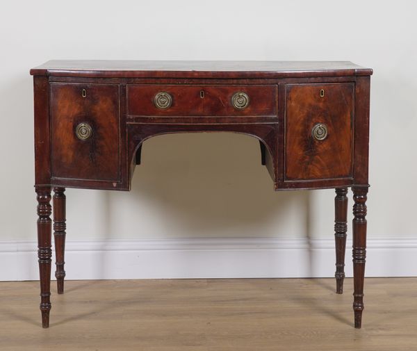 A REGENCY MAHOGANY BOWFRONT SIDEBOARD