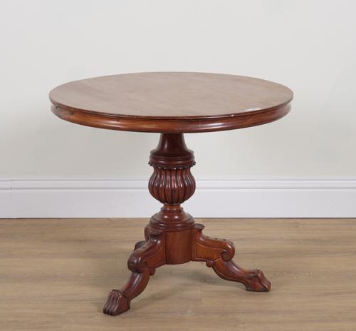 A 19TH CENTURY FRENCH CIRCULAR MAHOGANY CENTRE TABLE