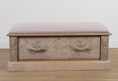 A RECTANGULAR LIFT TOP UPHOLSTERED OTTOMAN