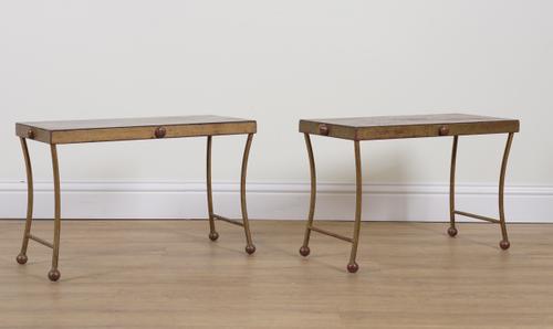 A PAIR OF RED PAINTED METAL AND PARCEL GILT LOW TABLES (2)