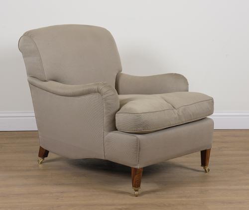 A HOWARD STYLE EASY ARMCHAIR